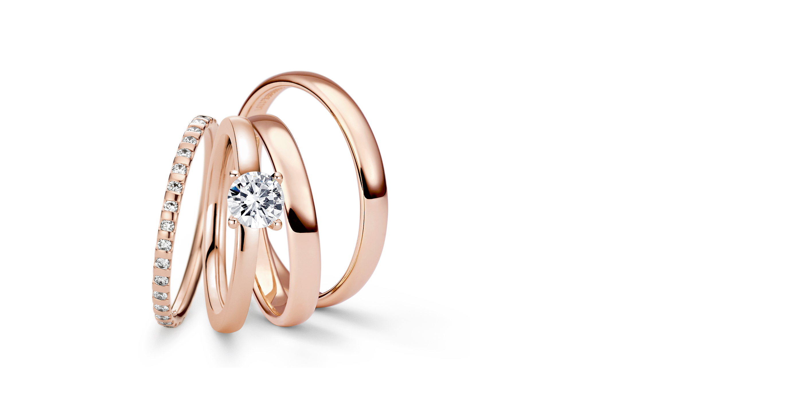 ROSÉ LEUCHTENDES GOLD MIT EINEM HERZ AUS PLATIN